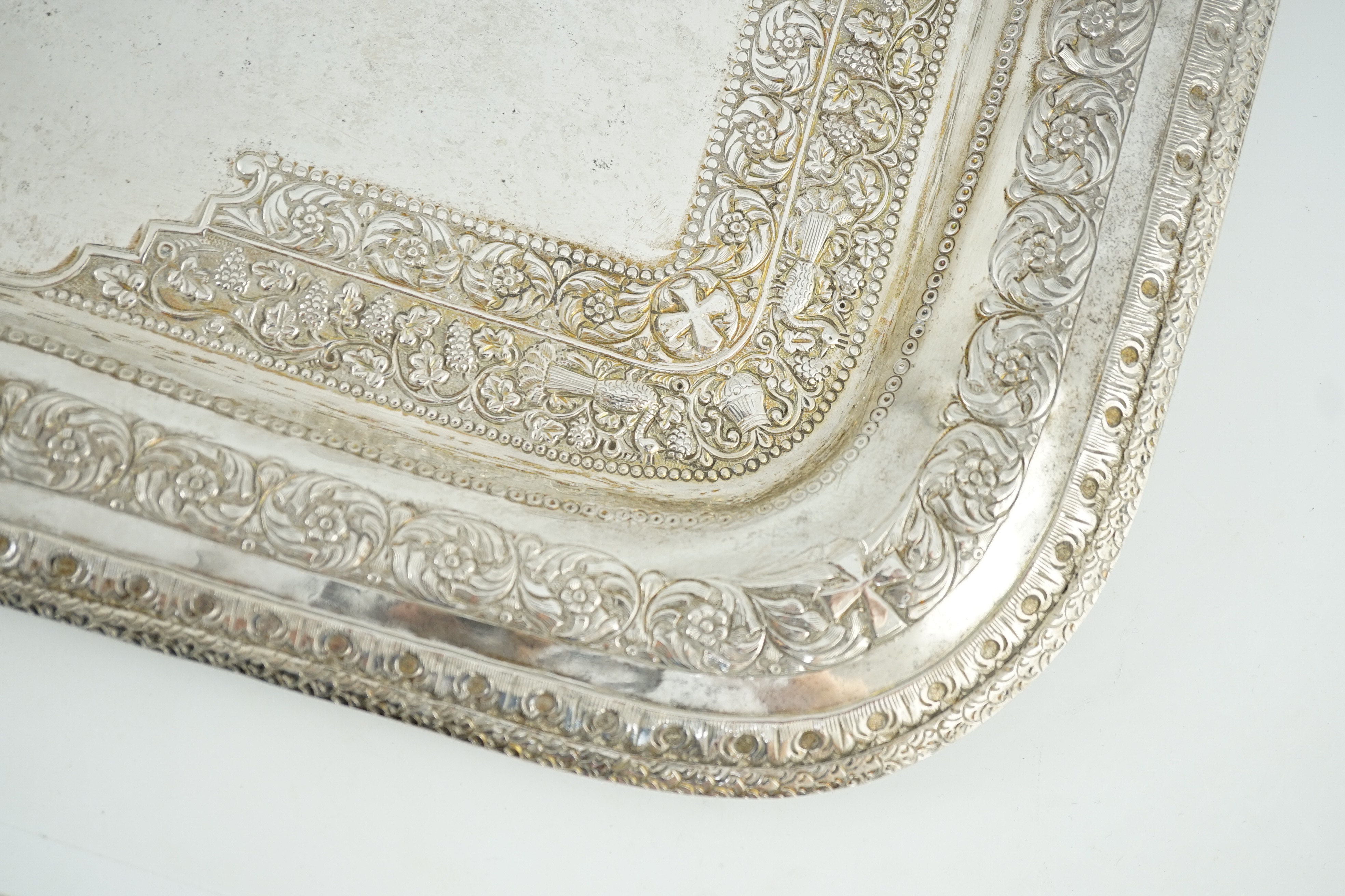 A 20th century Indian white metal rounded rectangular tea tray